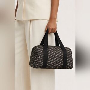 TNA Black and Brown Travel Bag